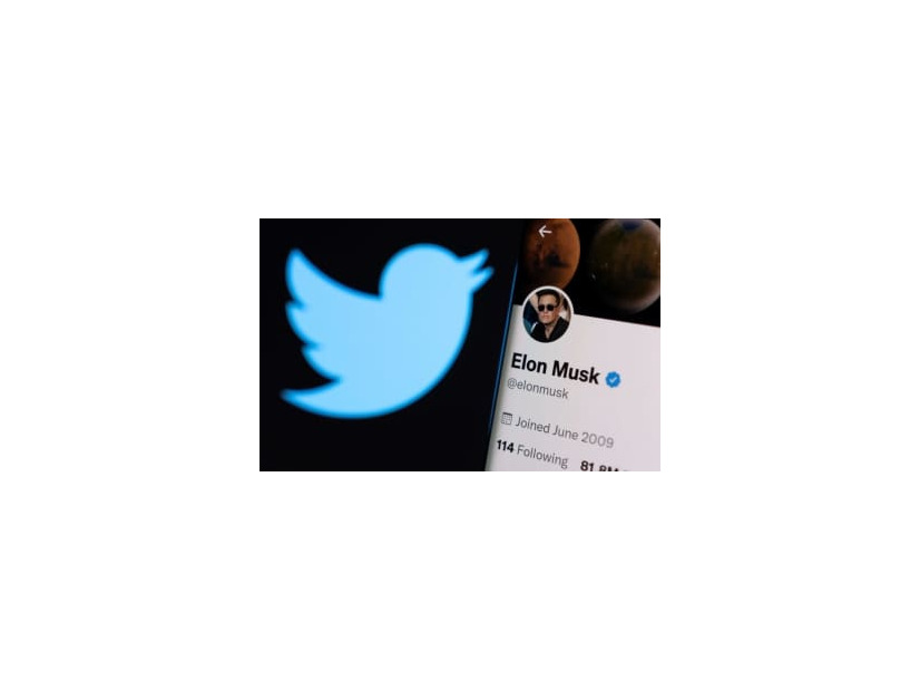 ツイッターのロゴとマスク氏のアカウント＝15日（ロイター＝共同）
