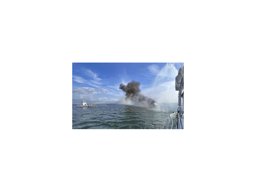 広島市南区の似島沖で炎上する旅客船「黒潮7」＝15日午前（広島海上保安部提供）