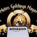 米アマゾン・コムと米映画会社メトロ・ゴールドウィン・メイヤー（MGM）のロゴ＝2021年5月26日（ロイター＝共同）