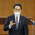 参院厚労委で答弁する岸田首相＝12日午後
