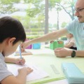 「キュリオキッズ」の開校直前の模擬授業風景＝5月、福岡市（NNA＝共同）