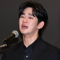 会見で涙するキム・スヒョン（Photo by Getty Images）