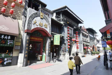 中国の5連休、人出3割減 画像