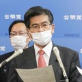会談を終え、取材に応じる公明党の石井幹事長＝21日午後、国会