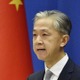 中国報道官、参列で「友好維持」 画像