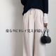 ストンと落ち感がある【GU】とろみワイドパンツ。リラックス感と品格がある大人のパンツスタイル【40代の毎日コーデ】 画像